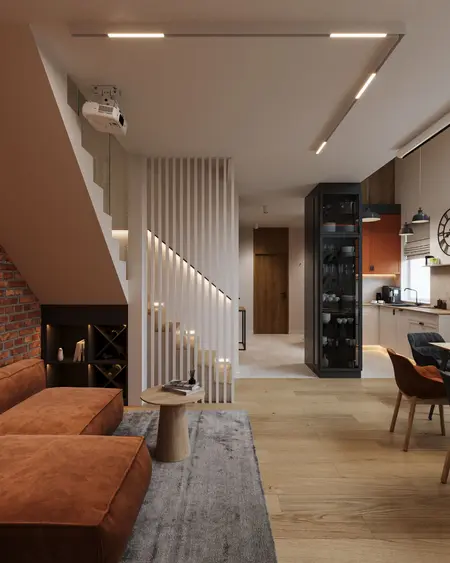 Salon w stylu industrialnym i nowoczesnym z brązową kanapą, drewnianą podłogą i ceglaną ścianą.