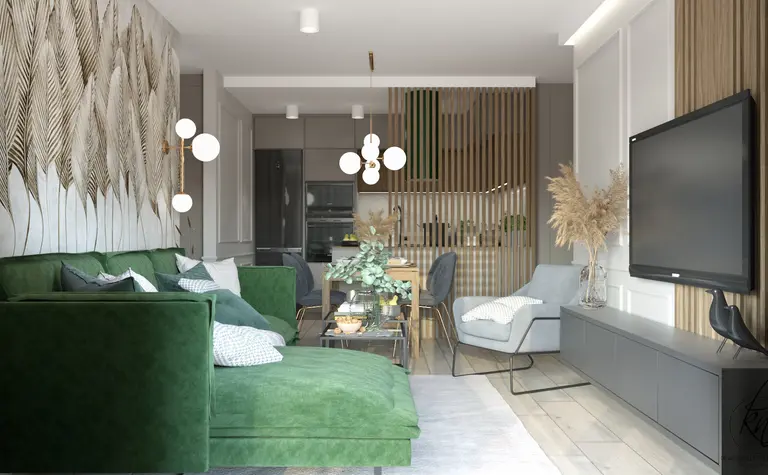 Nowoczesny salon z zieloną sofą, drewnianym stołem i dekoracyjną ścianą.