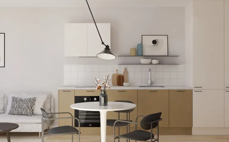 Jasna kuchnia w stylu japandi z minimalistycznym wystrojem.