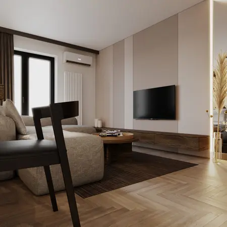 Minimalistyczny salon z szarymi meblami i drewnianym stolikiem.