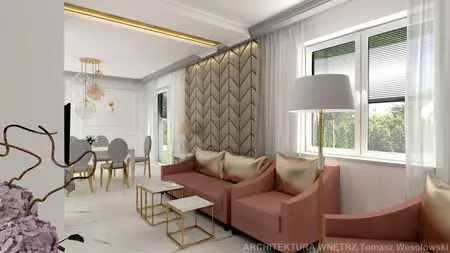 Wnętrze salonu w stylu glamour z różowymi sofami i złotymi akcentami.