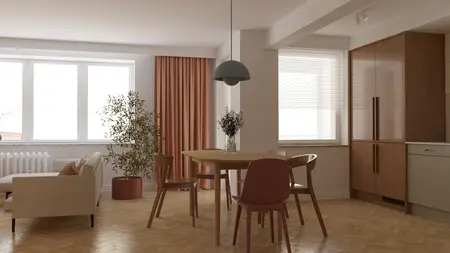 Wnętrze jadalni z drewnianym stołem, roślinami i eklektycznymi akcentami.