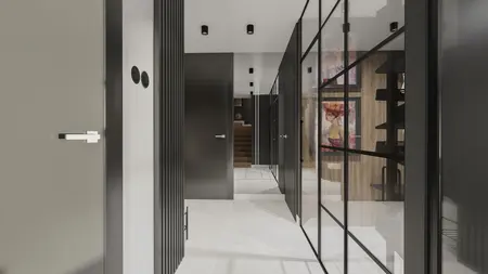 Korytarz w stylu industrialnym z czarnymi elementami i szklanymi ściankami