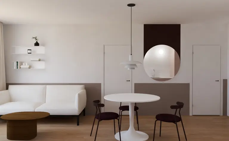 Minimalistyczny salon z białą sofą i okrągłym stołem, skandynawski wystrój.