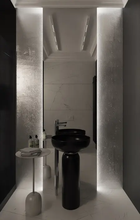 Nowoczesna łazienka z czarną umywalką, białymi kafelkami i minimalistycznym designem.