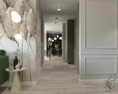 Nowoczesny korytarz z zieloną sofą i designerskimi lampami
