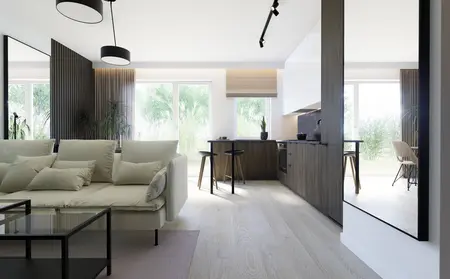 Współczesne wnętrze kuchni z jasnymi meblami i drewnianymi detalami.