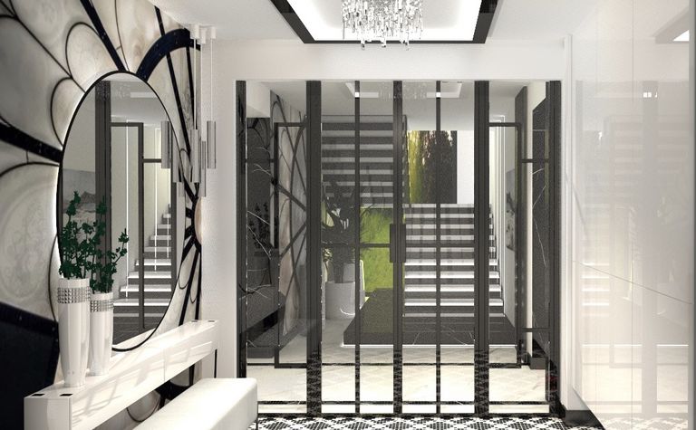Przedpokój w stylu art deco i glamour z czarną podłogą i dużym lustrem.