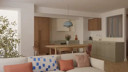 Wnętrze kuchni z brązowymi meblami, zielonymi detalami i nowoczesnym oświetleniem.