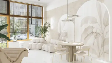 Wnętrze salonu w stylu minimalistycznym z jasnymi meblami i roślinnymi dekoracjami.