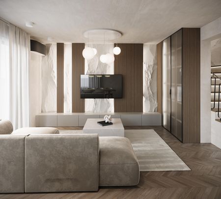 Wnętrze salonu w stylu soft minimalizm z jasnymi meblami i drewnianymi detalami.
