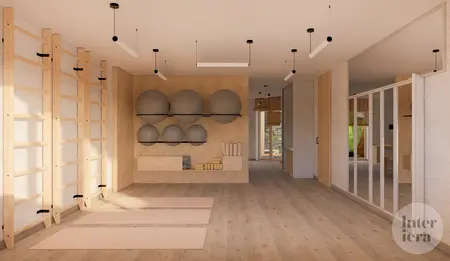 Wnętrze minimalistycznej sali do ćwiczeń w stylu japandi z drewnianą podłogą i akcesoriami.