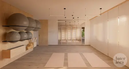 Wnętrze w stylu japandi i minimalistycznym z matami do ćwiczeń i lustrami.