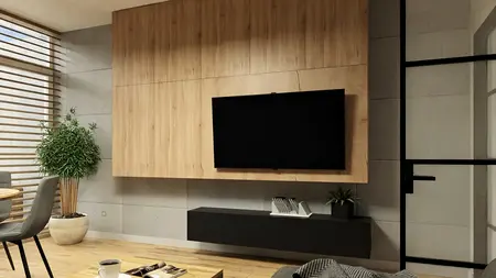 Wnętrze salonu z drewnianymi elementami, nowoczesnym telewizorem i rośliną.