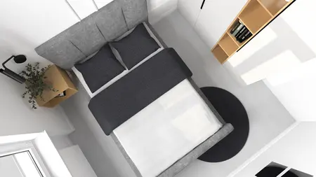 Wnętrze sypialni z szarym łóżkiem, drewnianymi meblami i rośliną, styl dopamine decor.