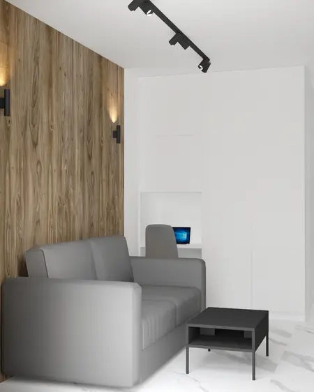 Nowoczesny salon z szarym obracanym fotelem, drewnianą ścianą i minimalistycznym oświetleniem.