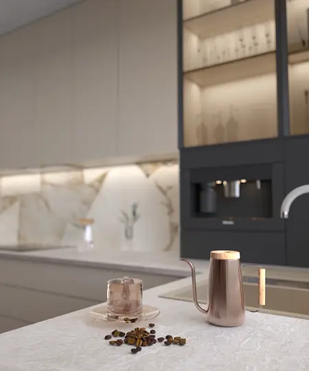 Wnętrze kuchni w stylu japandi i minimalistycznym z marmurowym blatem oraz eleganckimi akcesoriami.
