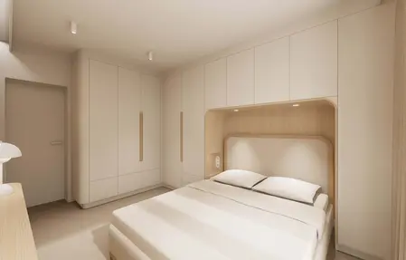 Wnętrze sypialni w stylu japandi i minimalistycznym z jasnymi meblami.