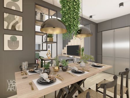Jadalnia w stylu industrialnym z drewnianym stołem i roślinami.