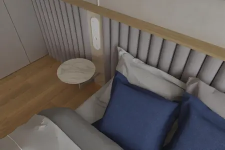 Sypialnia w stylu japandi z niebieskimi poduszkami i drewnianą półką.