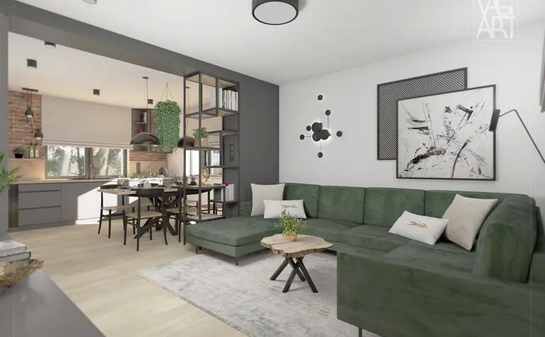 Wnętrze salonu w stylu industrialnym z zieloną sofą i drewnianym stołem.