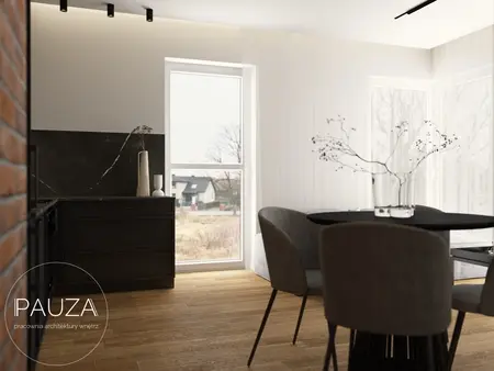 Wnętrze kuchni z czarnymi meblami i drewnianą podłogą, nowoczesny design.