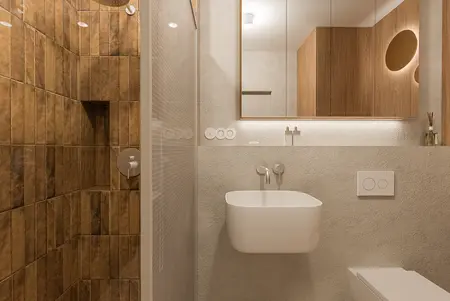 Łazienka w stylu boho i japandi z brązowymi płytkami i minimalistycznymi akcentami.