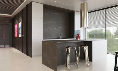 Nowoczesna kuchnia z minimalistycznym designem, białymi meblami i ciemnym blatem.