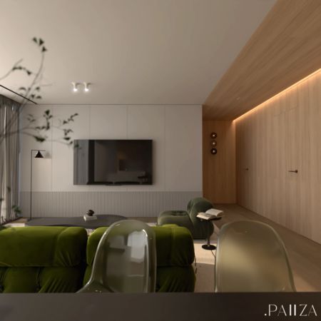 Wnętrze salonu w stylu minimalistycznym z zielonymi fotelami i drewnianymi elementami.