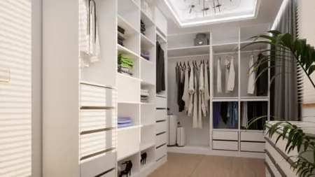 Garderoba w stylu nowoczesnym z białymi meblami i rośliną.