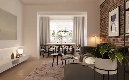 Wnętrze salonu w stylu eklektycznym z ceglaną ścianą i nowoczesnym oświetleniem.
