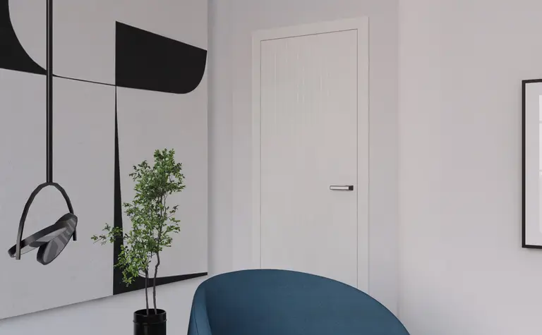 Nowoczesne wnętrze z fotelami w kolorze niebieskim, czarnym stolikiem i minimalistycznymi akcentami.