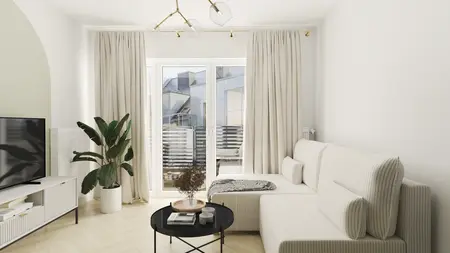 Salon w stylu boho, eklektycznym i minimalistycznym z jasną sofą i rośliną doniczkową.