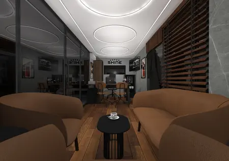 Wnętrze biura w stylu dopamine decor, industrialnym i japandi z brązowymi sofami.