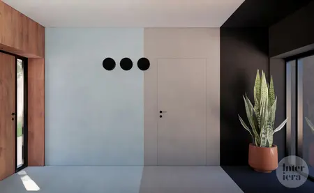 Eklektyczny przedpokój z drewnianymi detalami, minimalistyczną rośliną i neutralnymi kolorami.