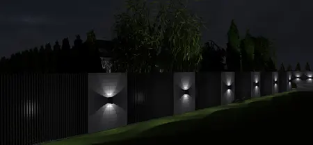 Widok na industrialny mur z lampami, roślinność w stylu japandi, nowoczesne oświetlenie.
