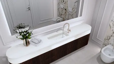 Nowoczesna łazienka z minimalistycznym designem, białą umywalką i brązową szafką.