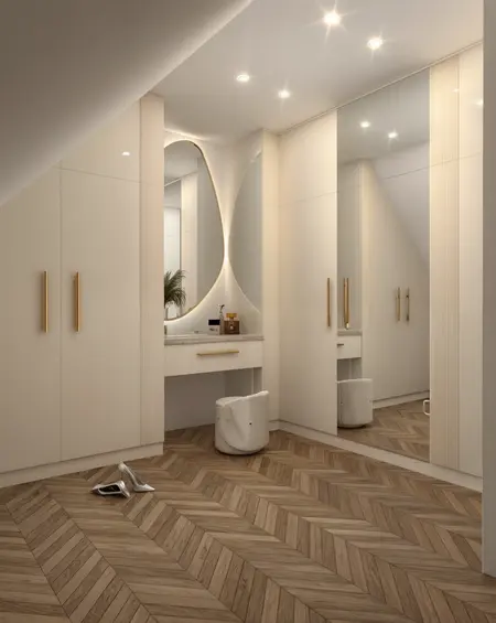 Garderoba w stylu glamour i minimaluxe z drewnianą podłogą i dużymi lustrami.