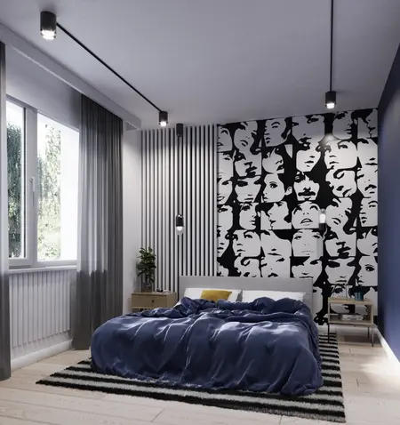 Eklektyczna sypialnia z niebieską pościelą, nowoczesnym oświetleniem i minimalistycznymi detalami.