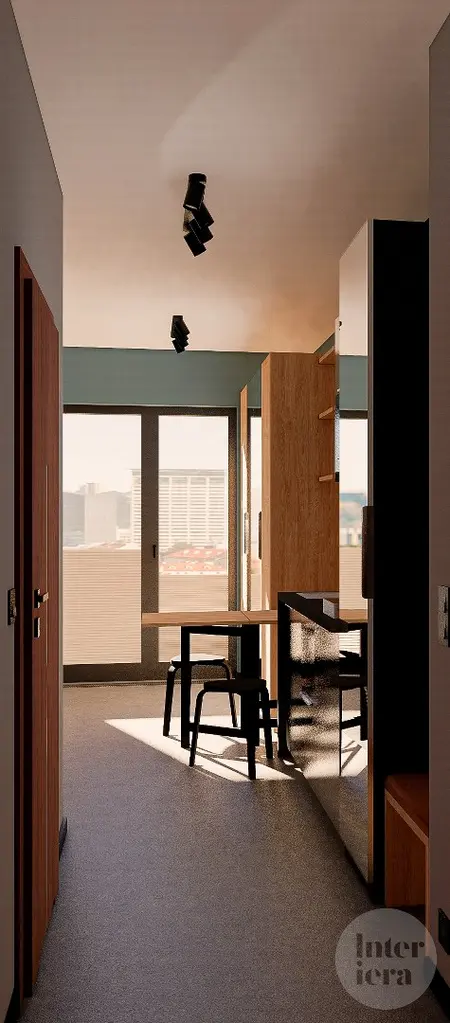 Wnętrze kuchni z minimalistycznym designem, nowoczesnymi meblami i współczesnymi detalami.