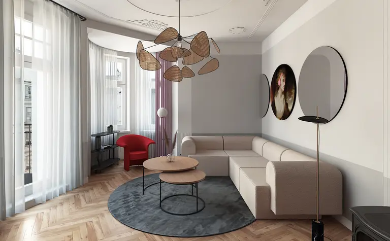 Wnętrze salonu z beżową sofą, czerwonym fotelem i nowoczesnym oświetleniem dopamine decor.