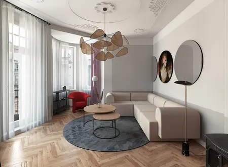 Wnętrze salonu z beżową sofą, czerwonym fotelem i nowoczesnym oświetleniem dopamine decor.