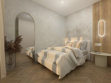 Sypialnia w stylu japandi z drewnianą podłogą i nowoczesnym łóżkiem.