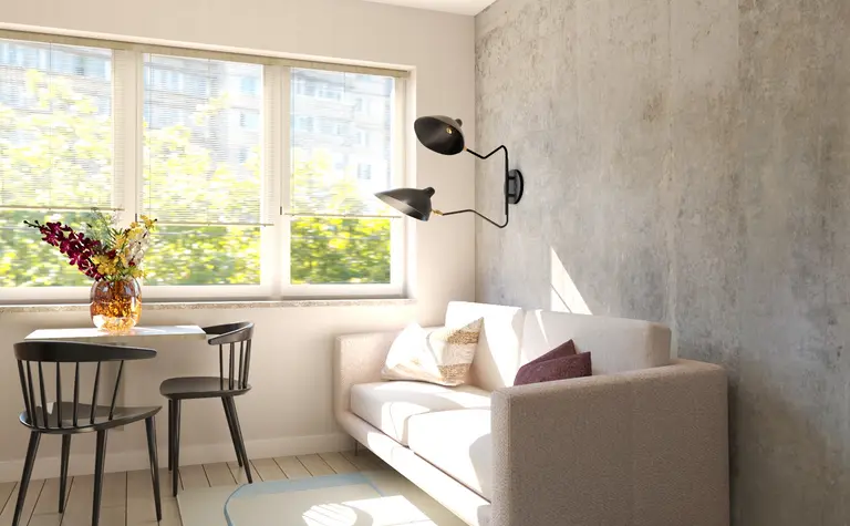 Wnętrze salonu w stylu soft minimalizm z vintage akcentami i współczesnym wystrojem.