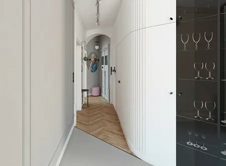 Przedpokój z białymi ścianami, drewnianą podłogą i dekoracjami dopamine decor.