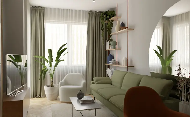 Wnętrze salonu w stylu soft minimalizm z zieloną sofą, roślinami i drewnianymi akcentami.