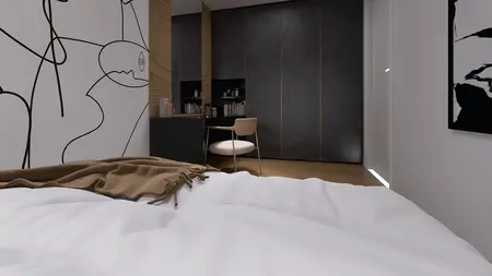 Wnętrze sypialni z białym łóżkiem, ciemnymi meblami, industrialnymi detalami.