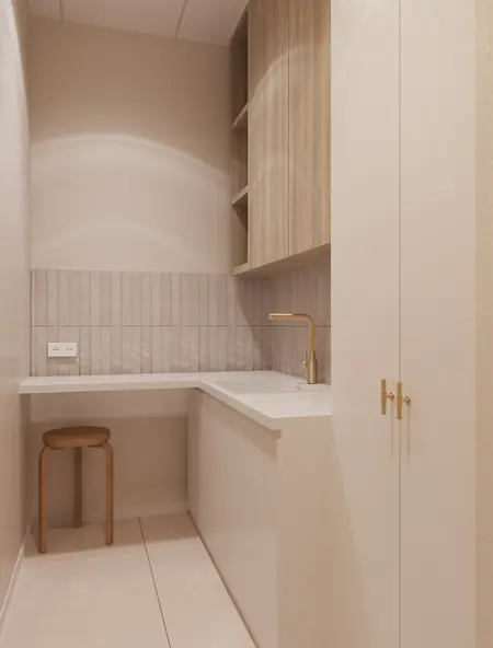 Minimalistyczne wnętrze kuchni z białym blatem i drewnianymi akcentami.