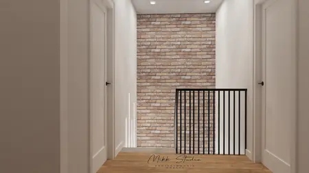 Korytarz z ceglaną ścianą, białymi drzwiami i drewnianą podłogą w stylu współczesnym.