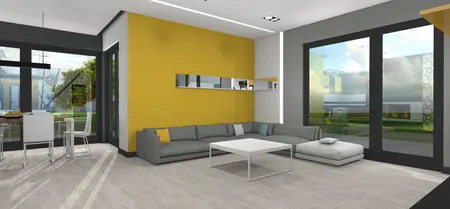 Wnętrze salonu w stylu industrialnym z szarym narożnikiem oraz żółtą ścianą.